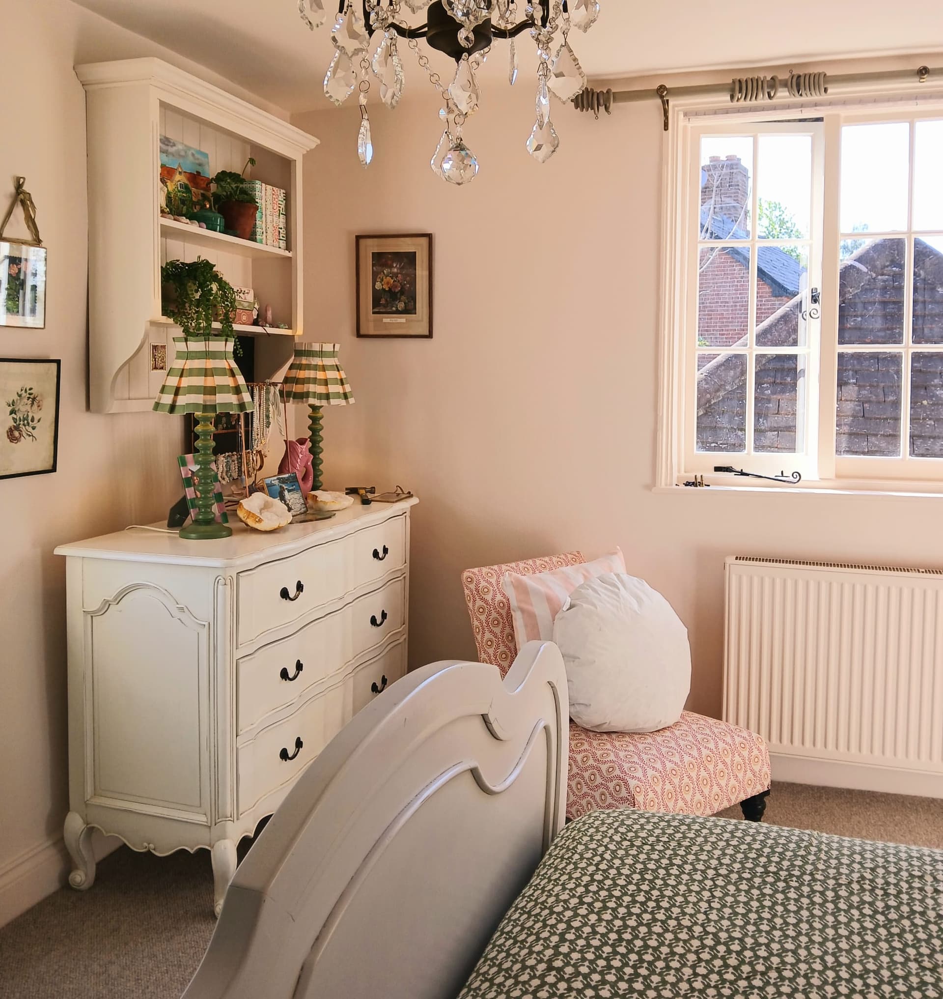 Bedroom with crystal chandelier