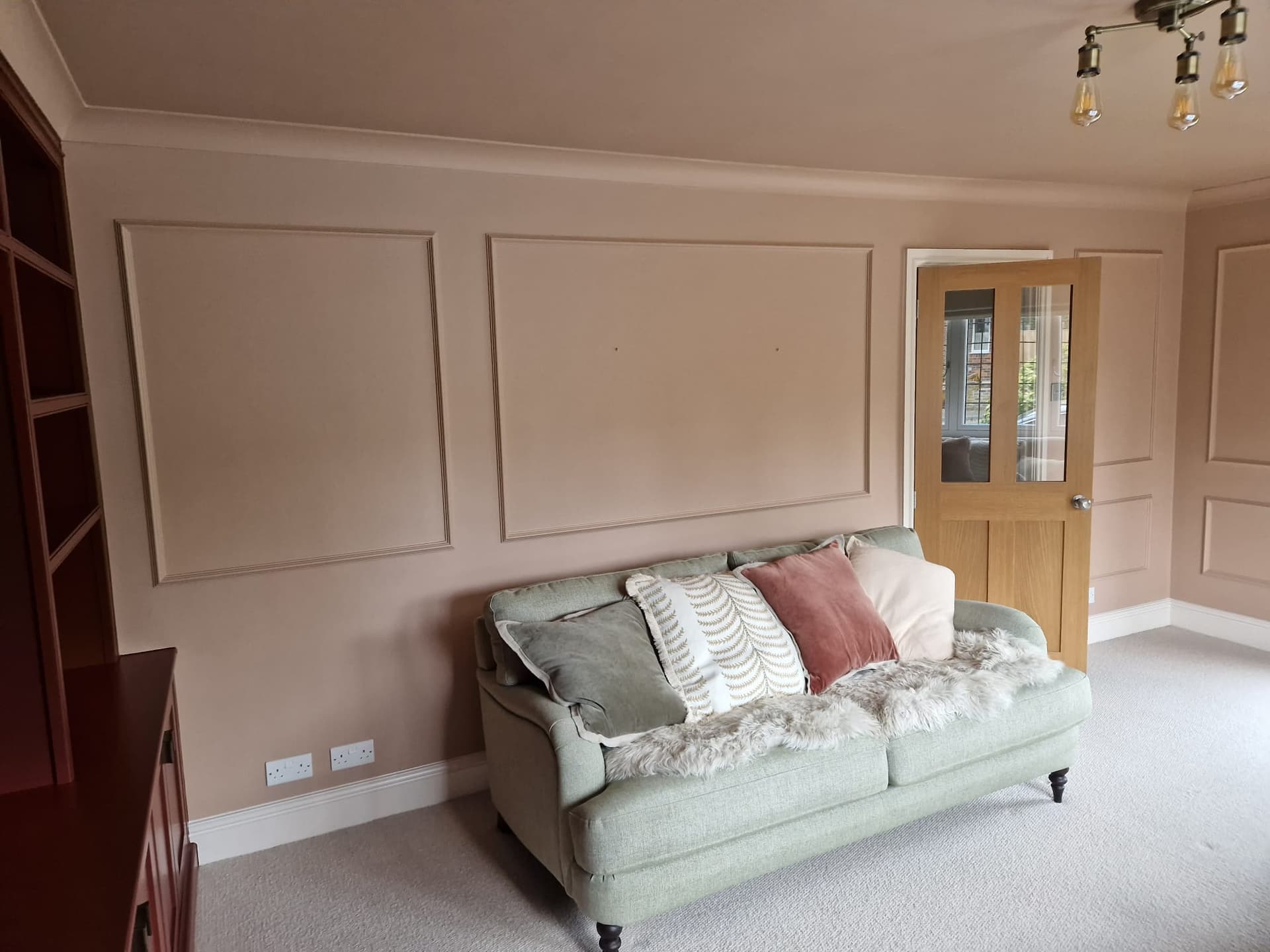 Sitting room with built-in shelving