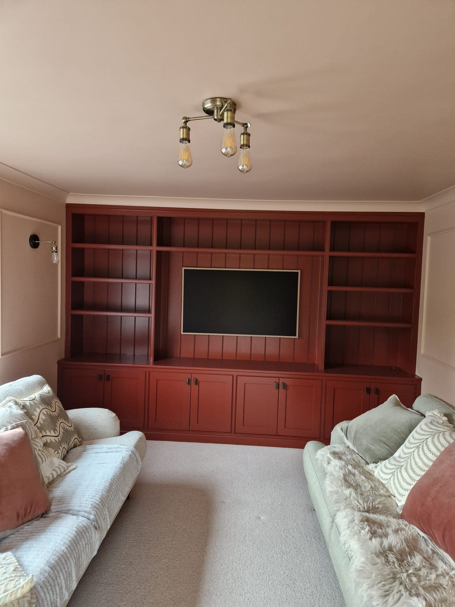 Sitting room — red painted built-in shelving